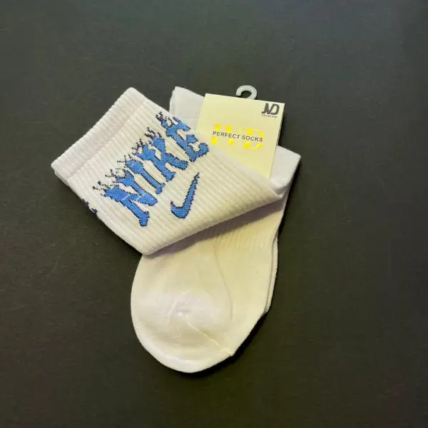 قیمت جوراب ساق بلند سفید ورزشی نوشته دار nike طرح آتشی
